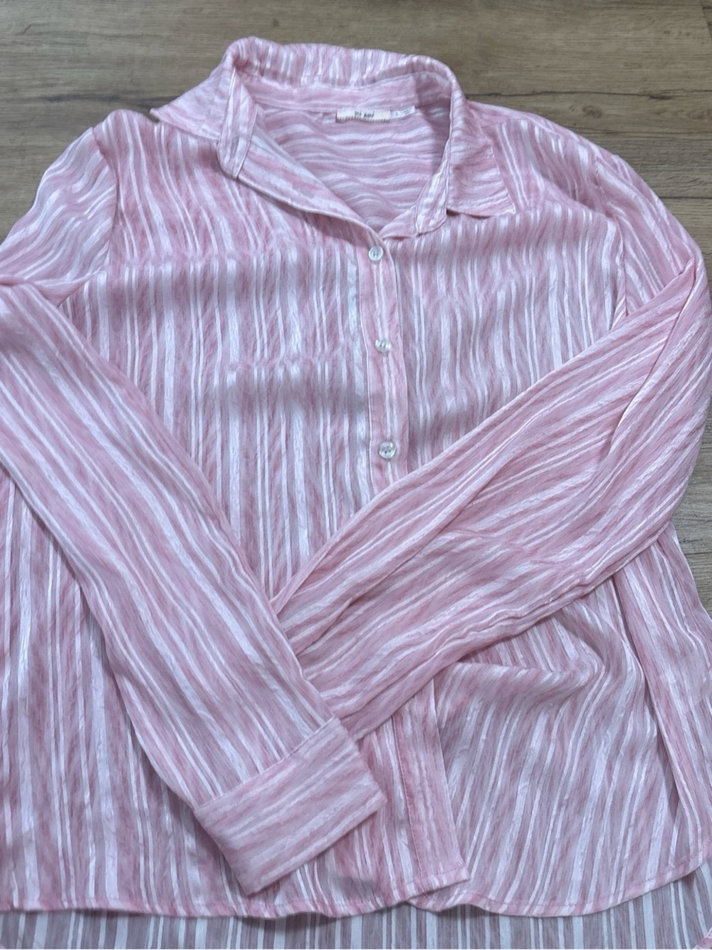 Francesca’s pink button up blouse